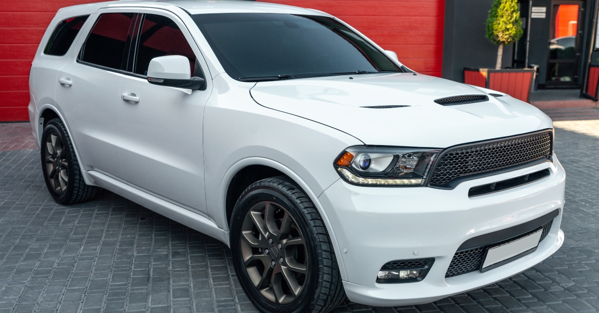 White Dodge Durango in the park