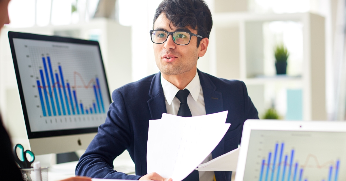 young economist talking to his colleague
