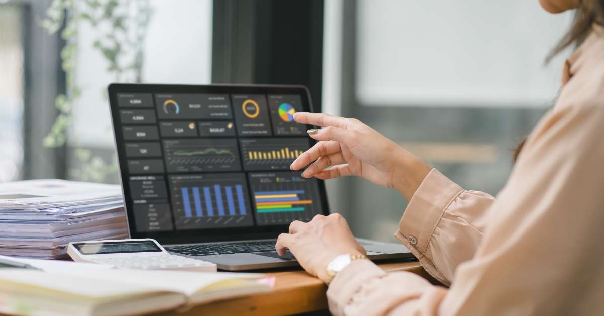 female analyst utilizes a computer 