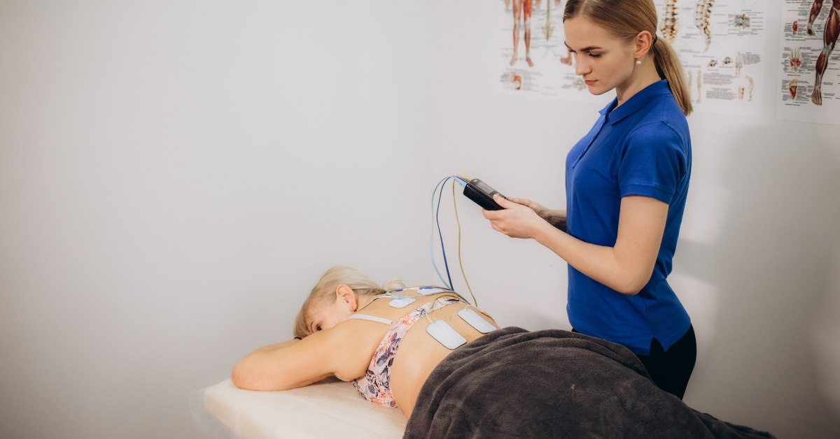 female patient is using electrical stimulation