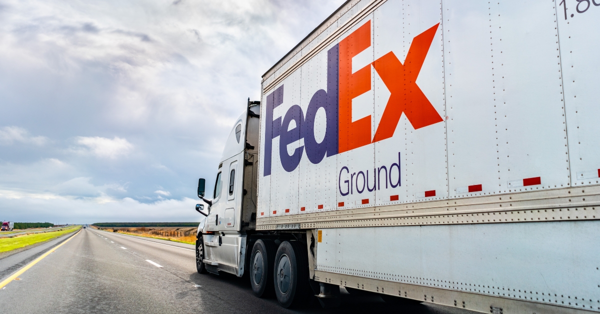 FedEx Ground truck driving on the interstate
