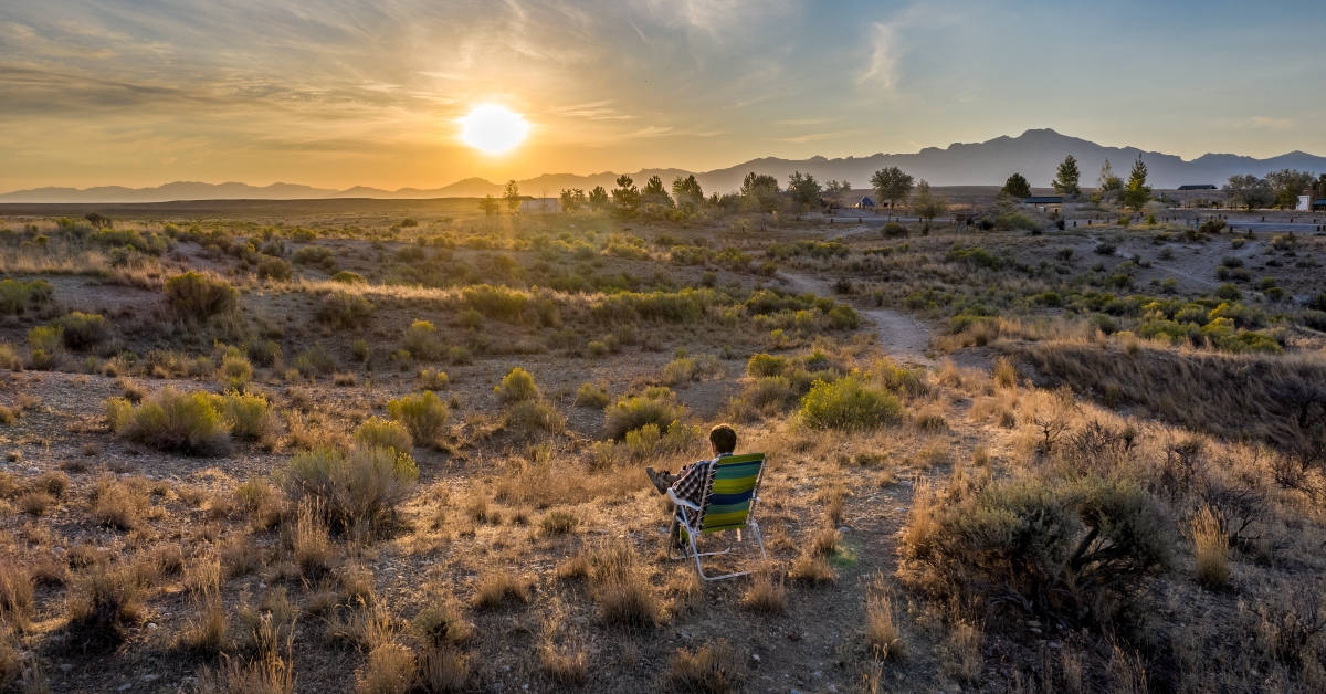 A person sitted in a field