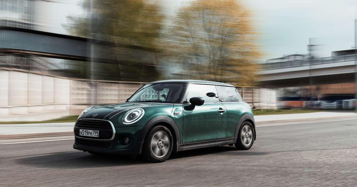 mini cooper 3-door hatchback at the city road in motion