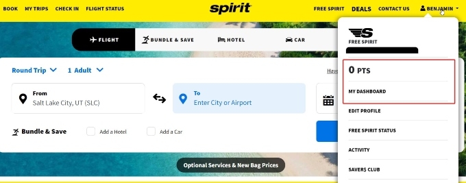 The Spirit Airlines website with a pop-up showing your Free Spirit points balance and options to view your dashboard, edit your profile, and more.