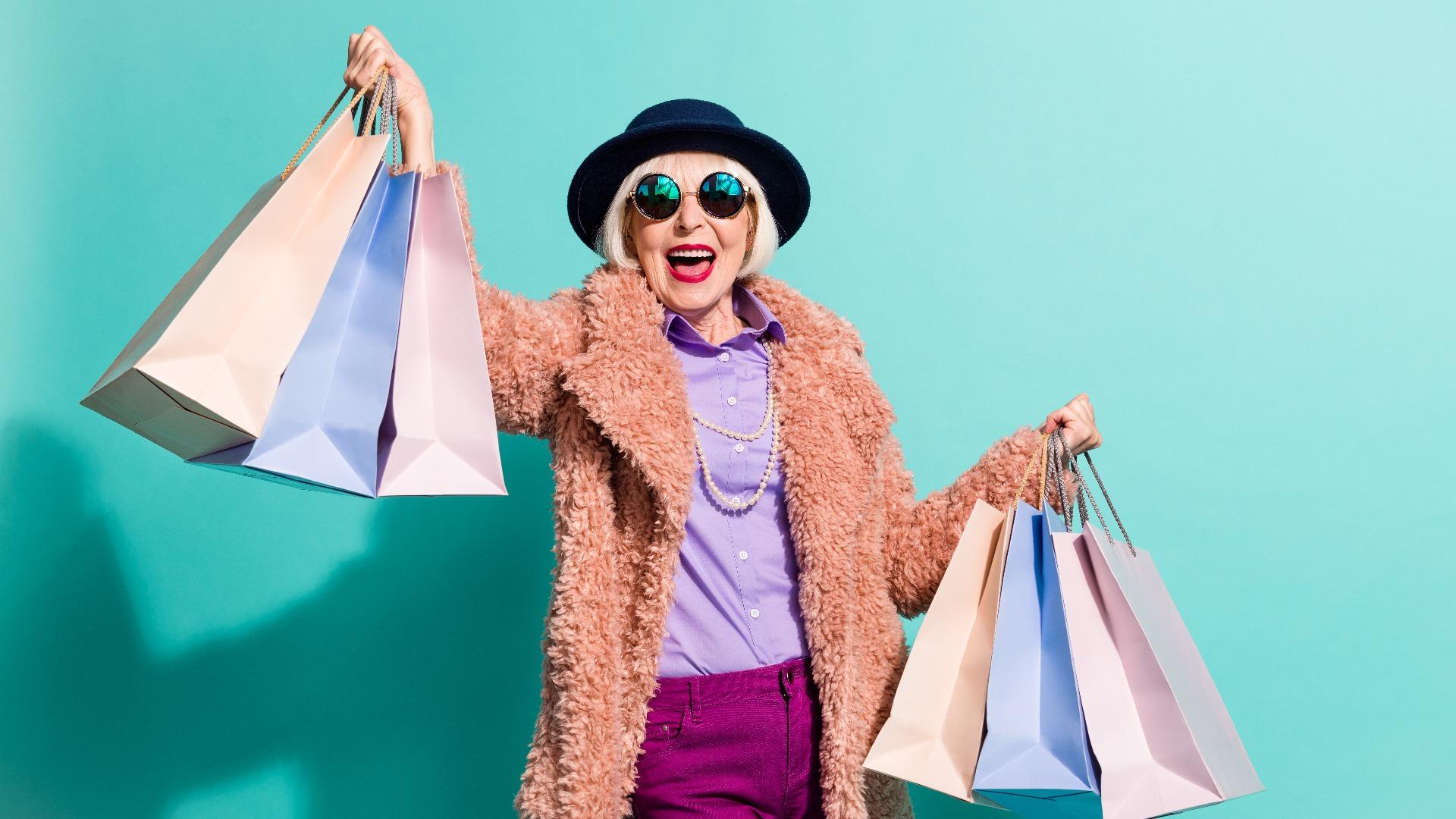 Senior lady holding shopping bags