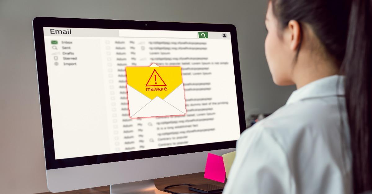 businesswoman using computer and show malware screen