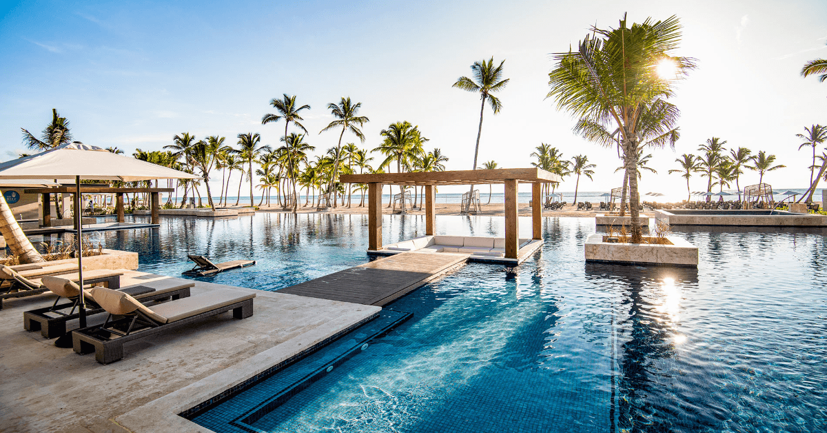 View of hotel pool and palm trees