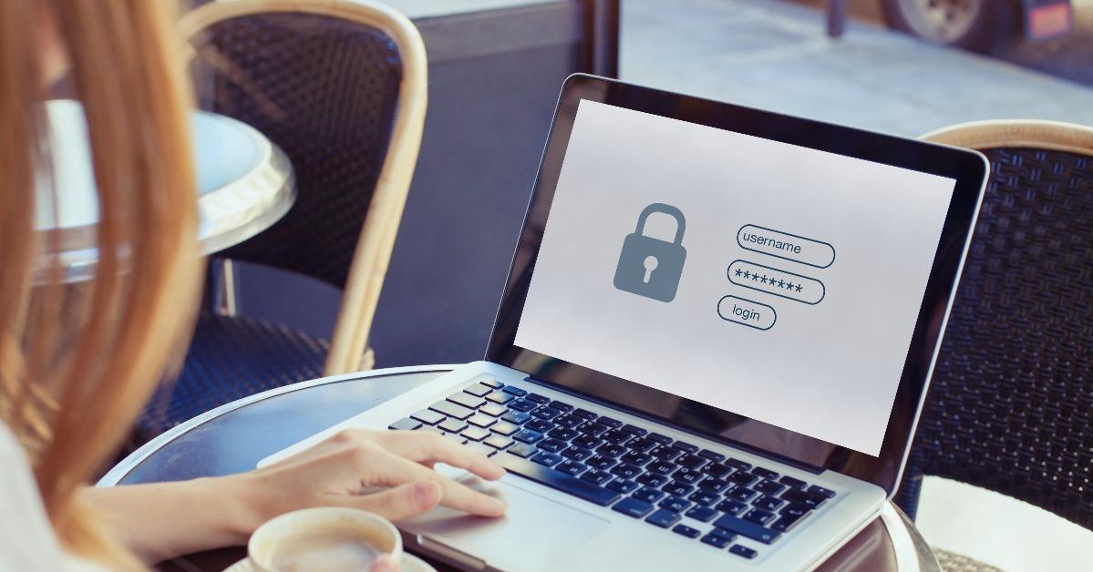 woman user typing password on computer for secured access