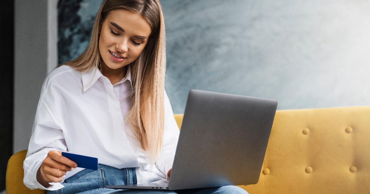 female using bank card to pay