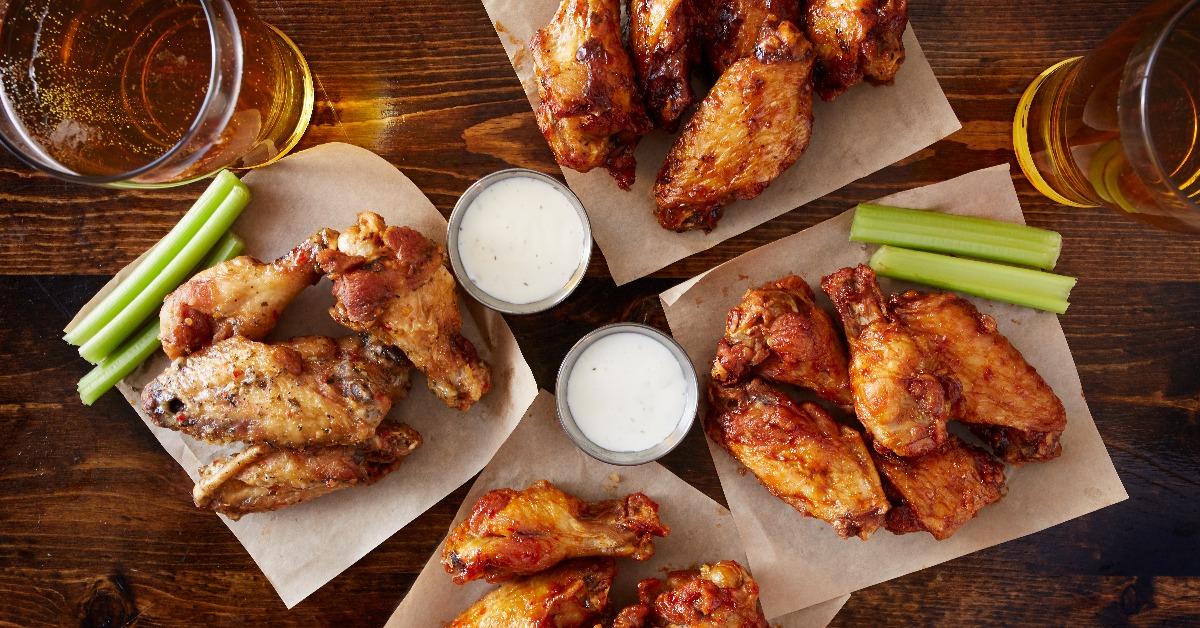 chicken wings with ranch dressing, beer, and celery sticks