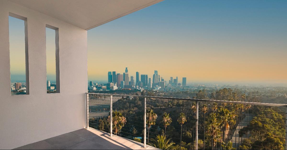 Balcony of a luxury home with views of Los Angeles skyline in the afternoon