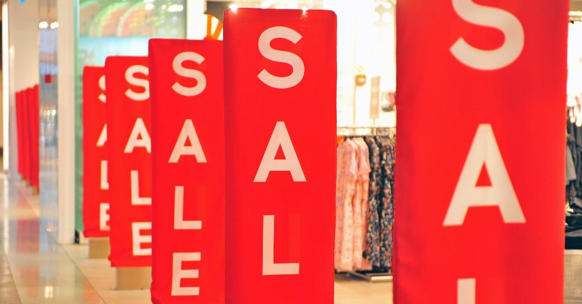 Sale red signs at retail store