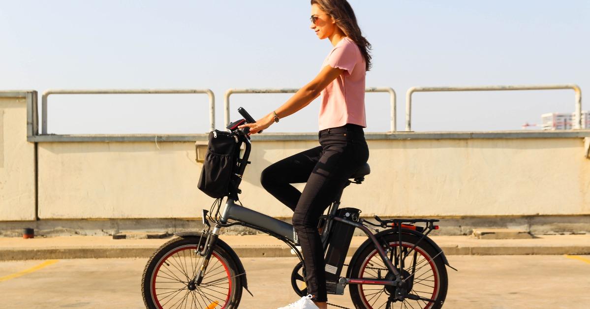 young woman riding an electric bicycle