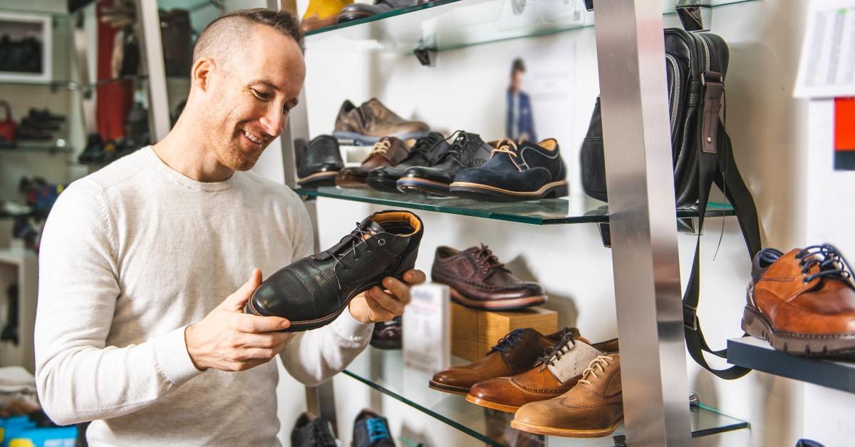 man looking for a new shoes in the shoe shop