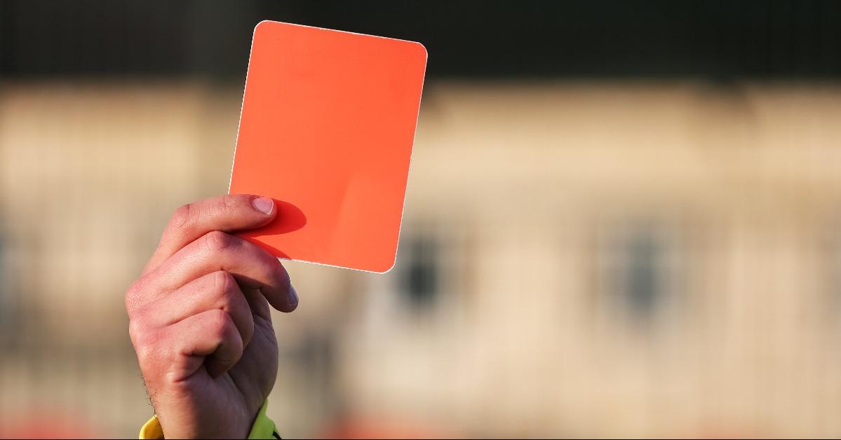 football referee shows a red card