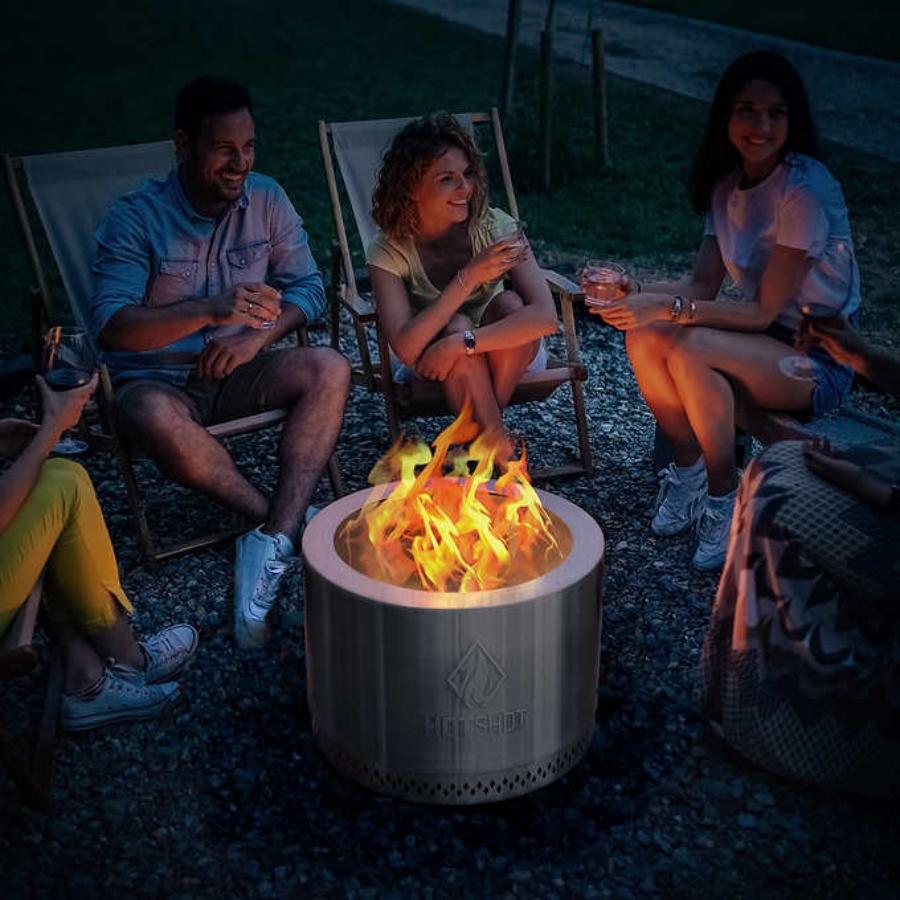 People sitting around fire pit