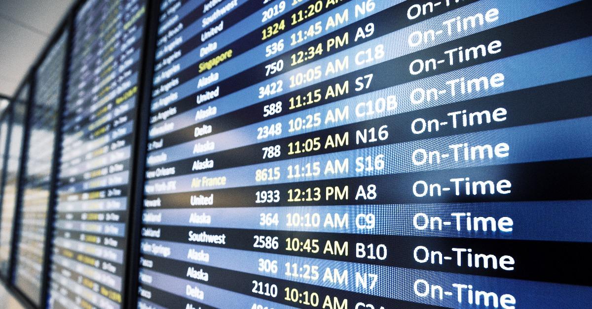 info of flight on billboard in airport