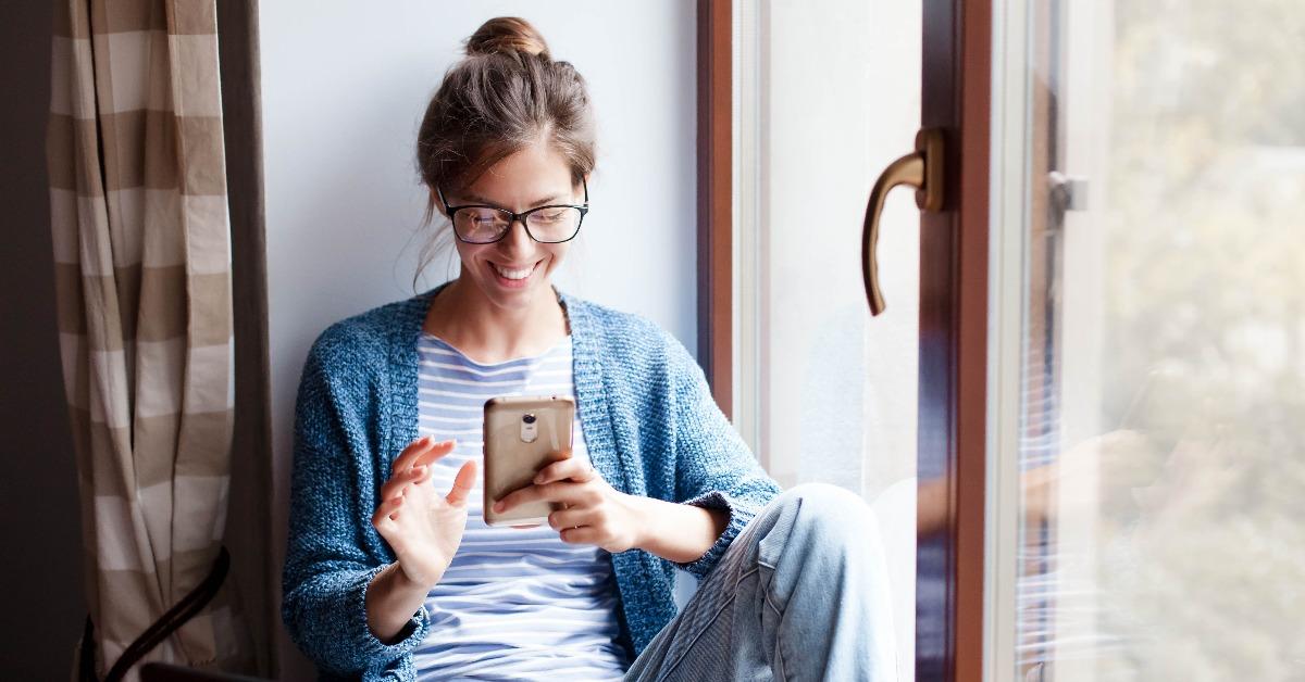 Young woman makes purchases in the Internet