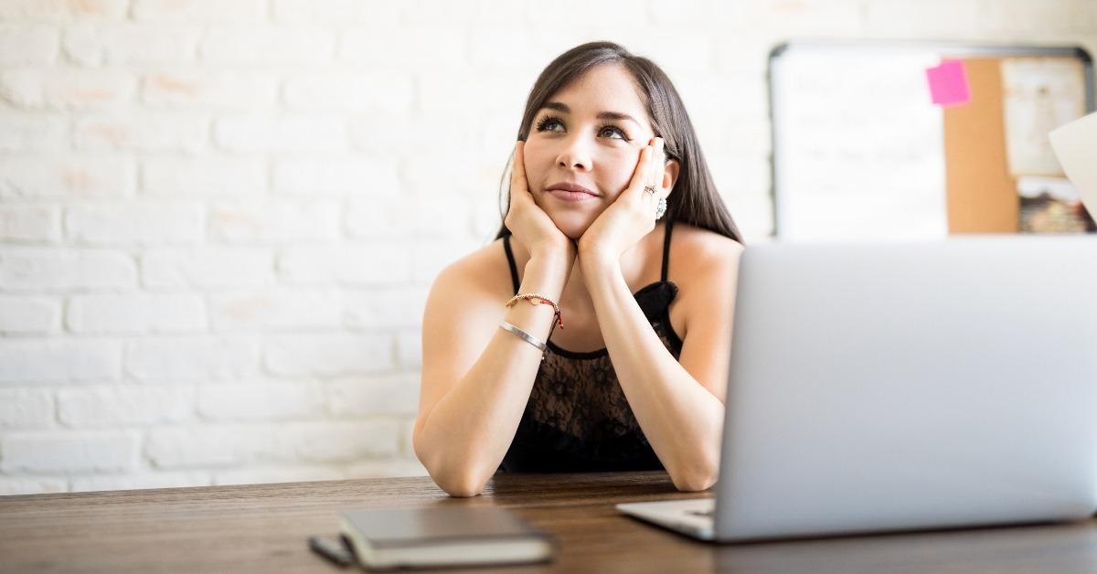 Thoughtful woman day dreaming