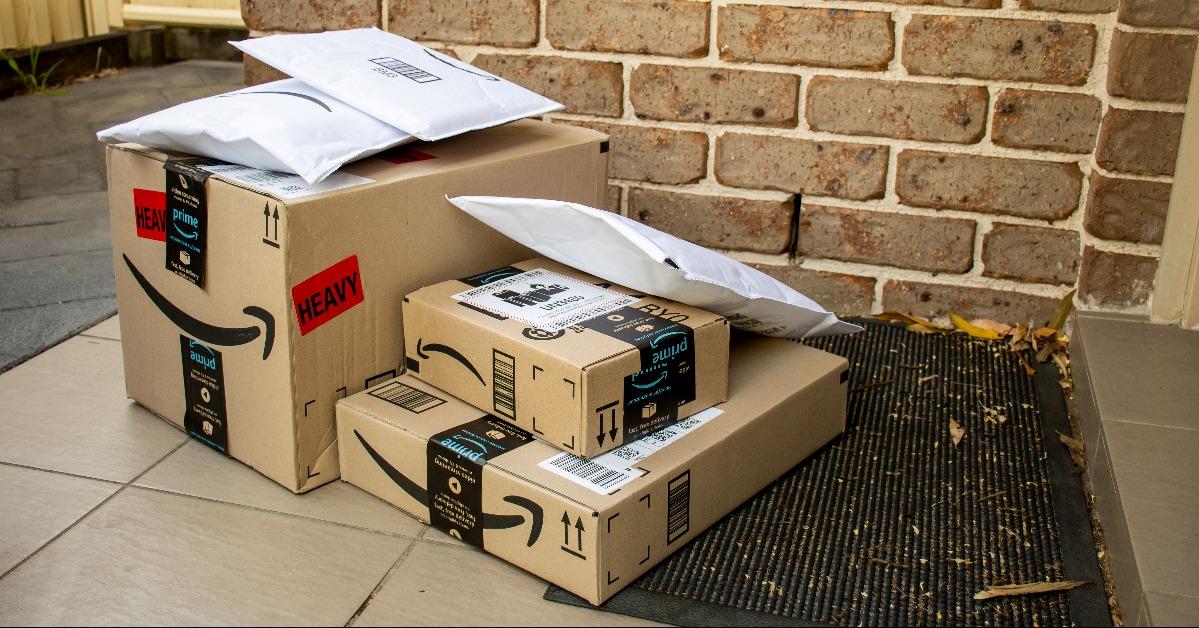  Amazon prime boxes and envelopes delivered to a front door