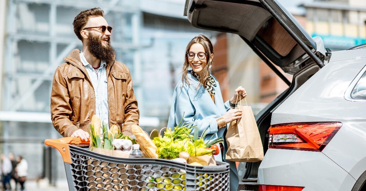 packing products into the car on the outdoor parking