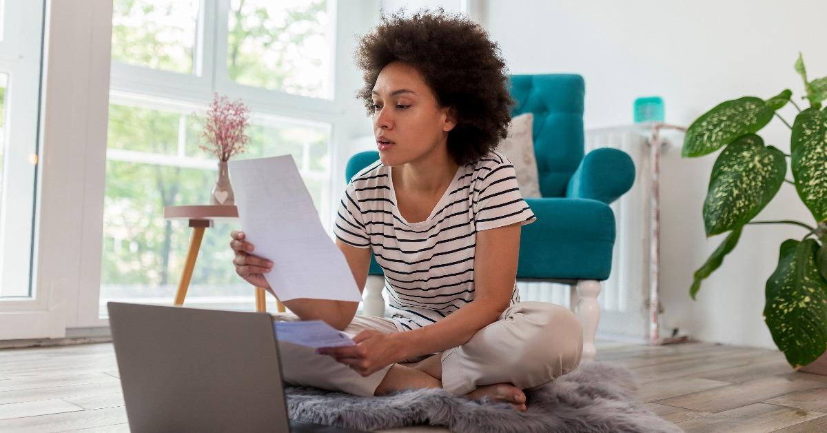 Woman paying bills online