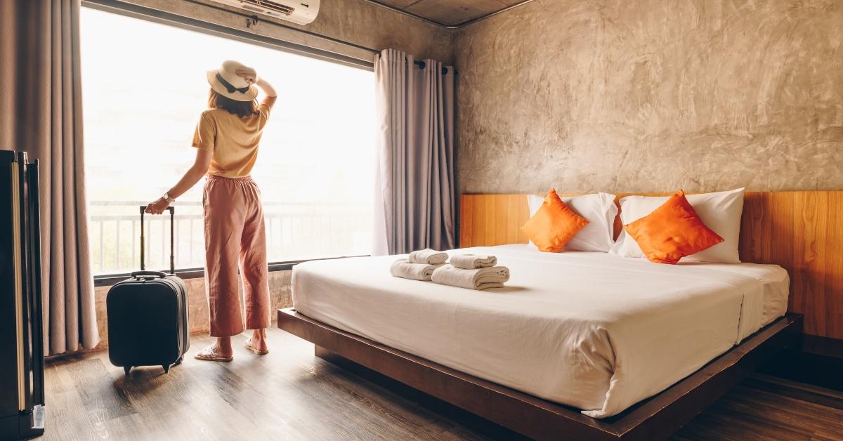 Woman in hotel room