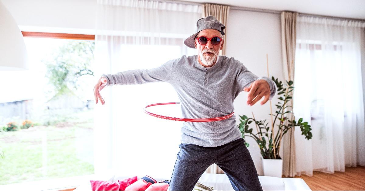 Senior man having fun at home