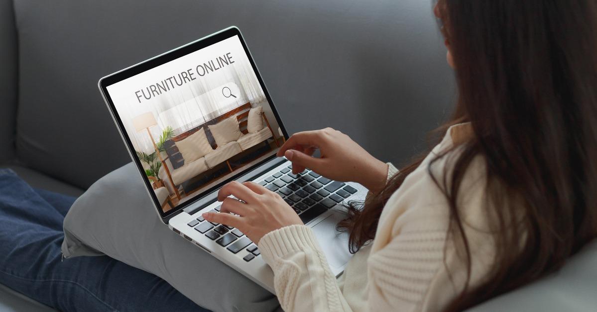 woman surfing the internet looking for furniture