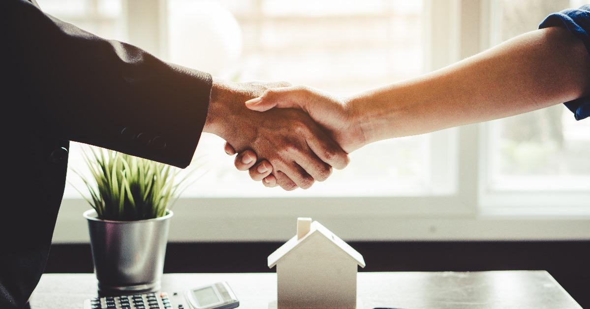  homeowner is happy after receiving the transfer of the right to occupy the home