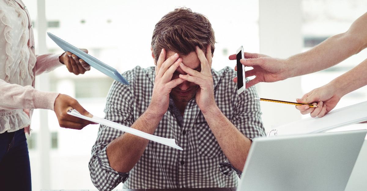Businessman stressed out at work
