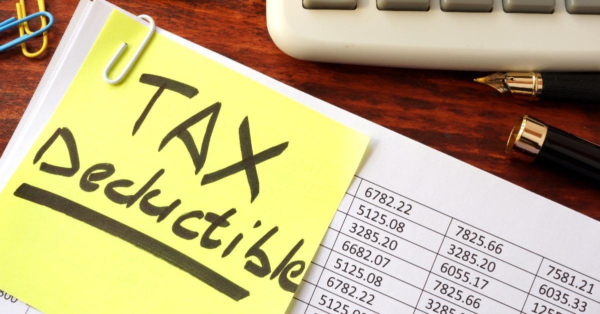 sticker with title tax deductible and financial documents