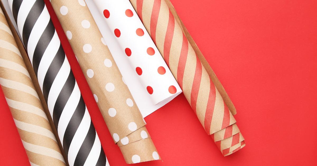 rolls of craft papers on red background