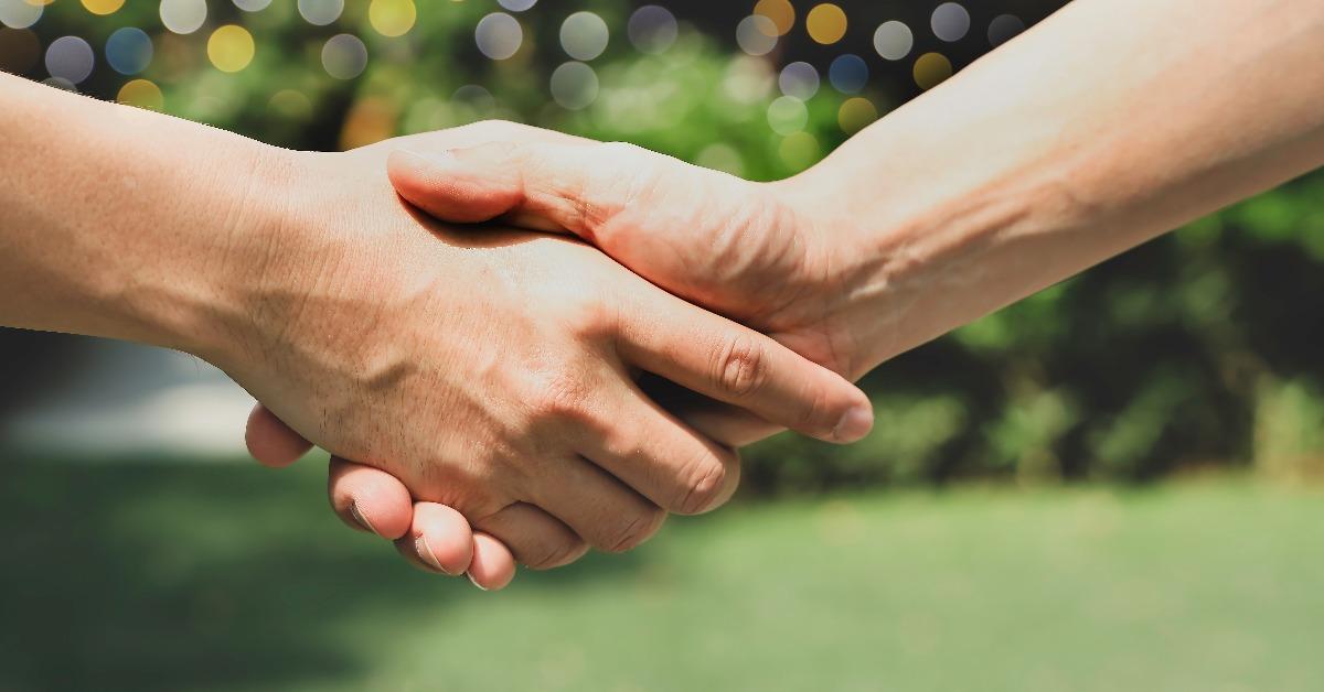 business partners shaking hand