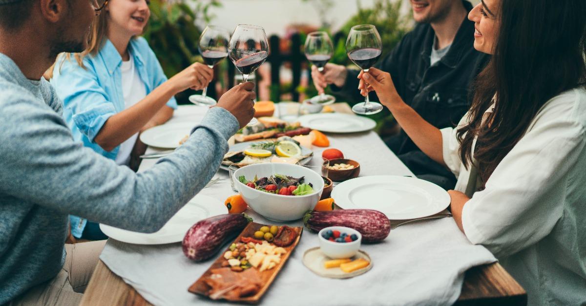 people dining out smiling and laughing
