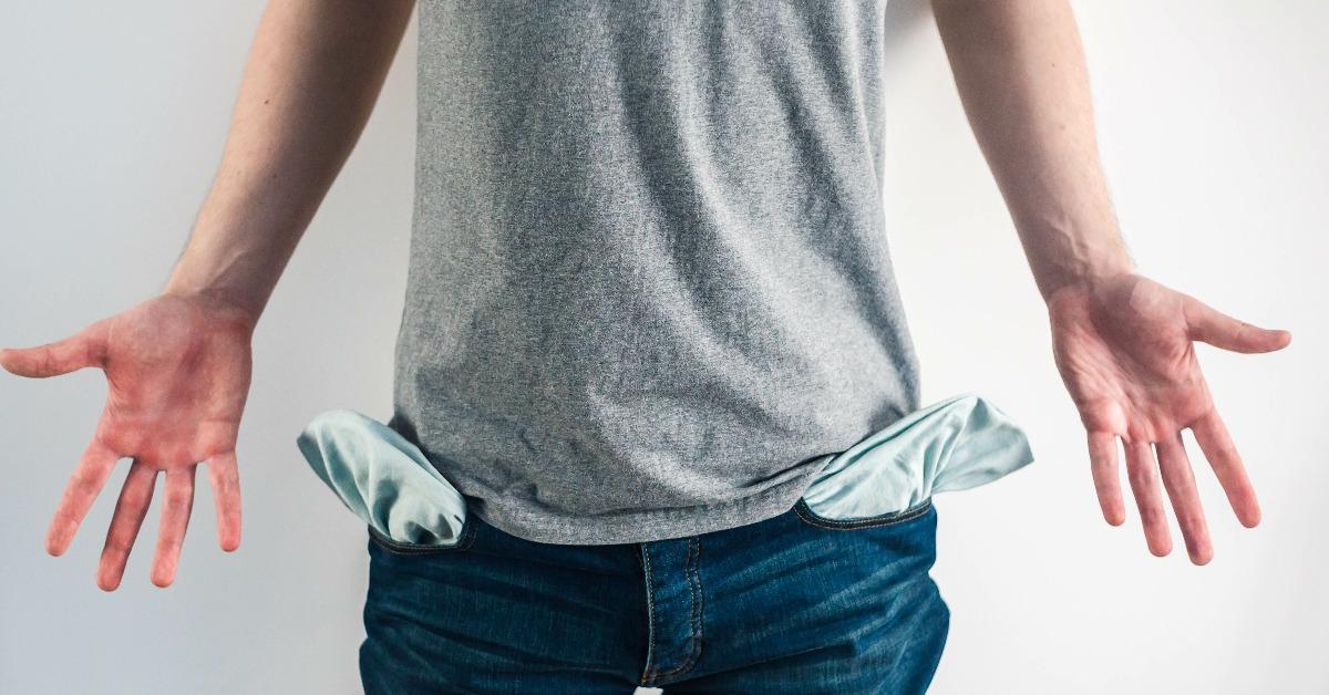 male shows empty pockets 