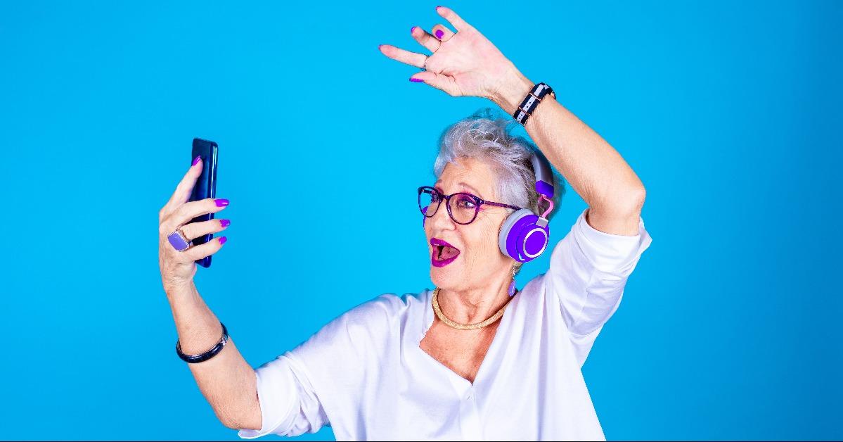 old woman enthusiastic dancing 