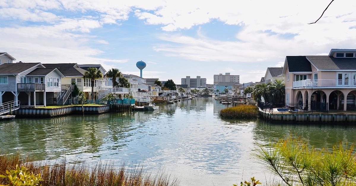 waterfront homes with balconies and docks
