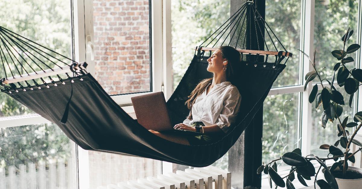 businesswoman working on a hammock