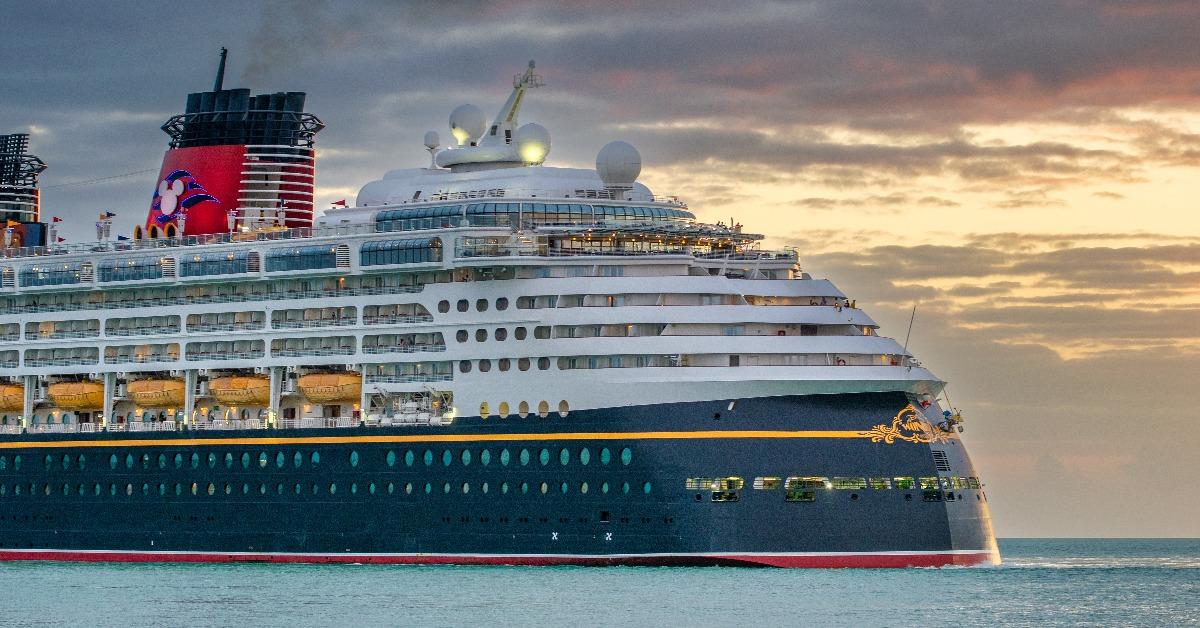 Disney Cruise Ship sailing at sunset