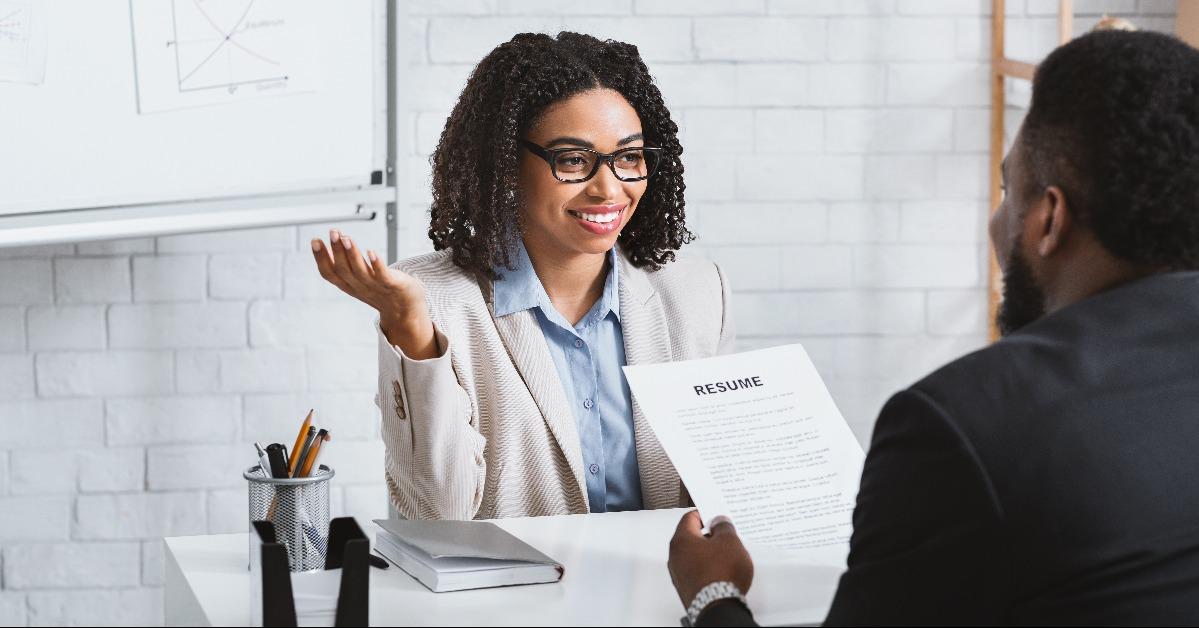 manager interviewing black candidate during job interview