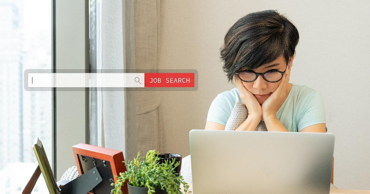  woman using computer laptop to search for a new job