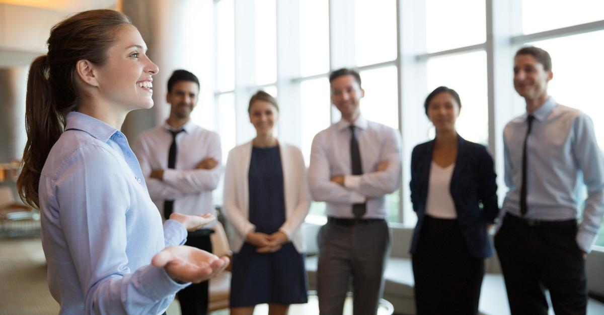 female executive manager and team
