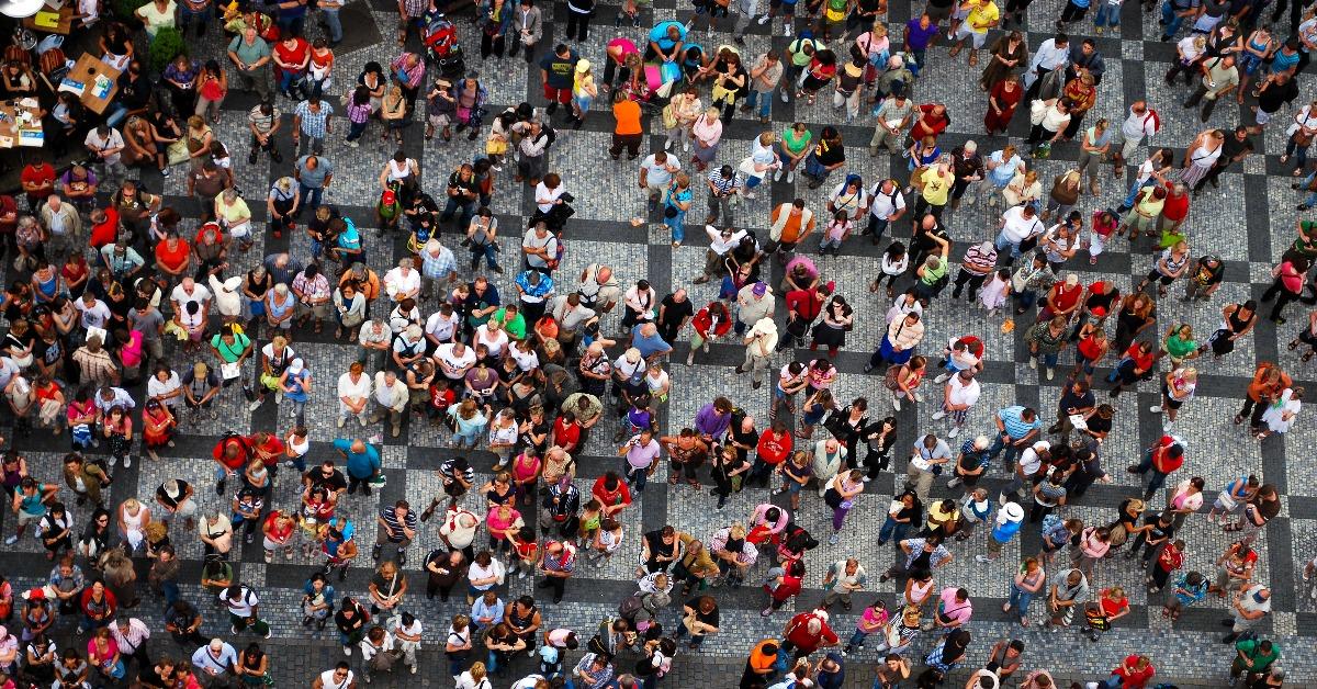  photograph of people gathered in a square
