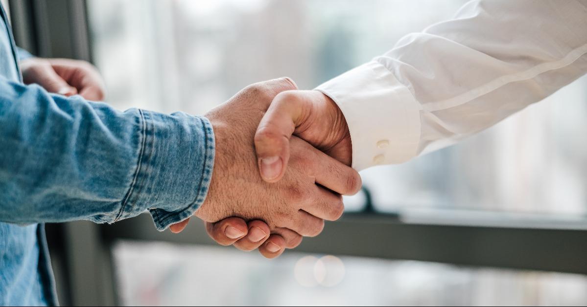 teamwork handshake in the office