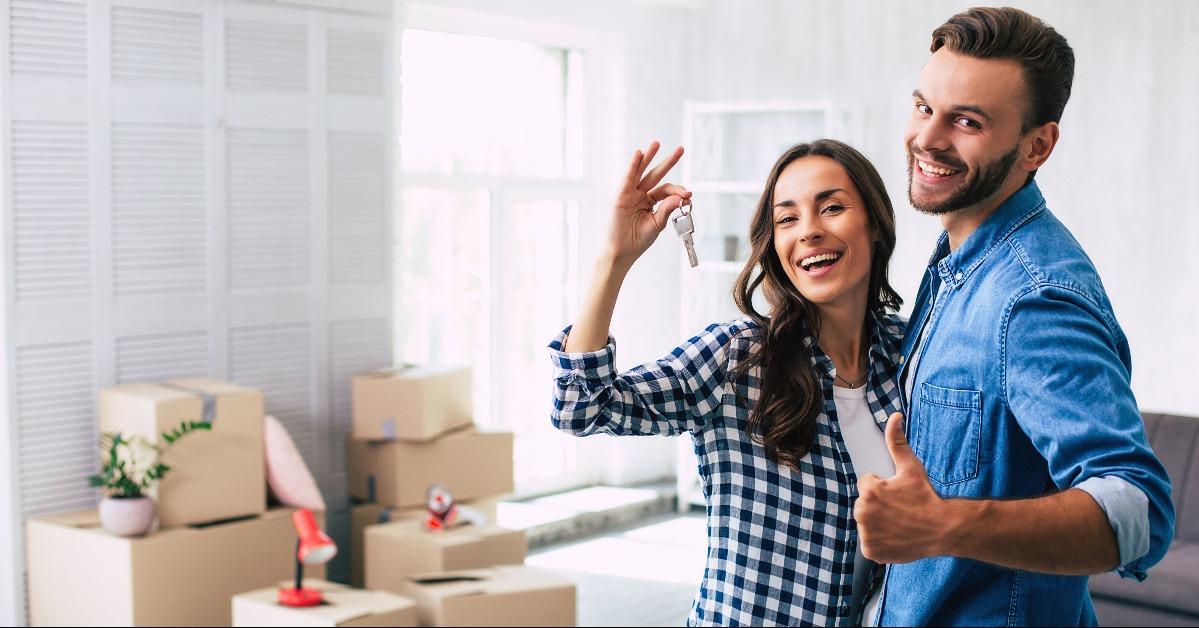 lovely couple feels very ecstatic about their recent purchase of a new home