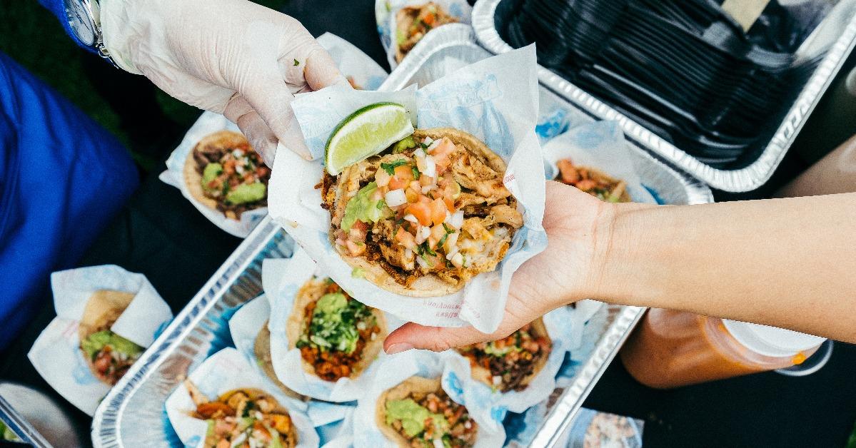 hand holding a taco