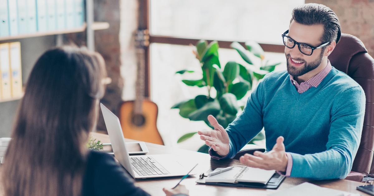 businessman asking candidate questions