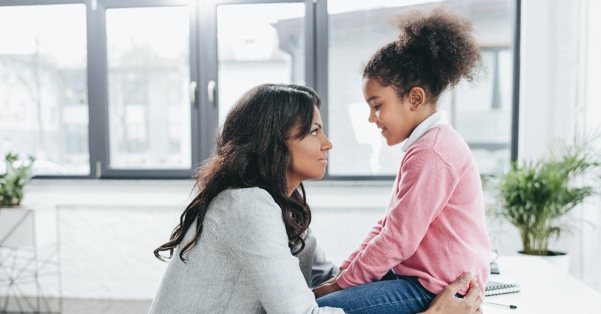 mother talking with her daughter 