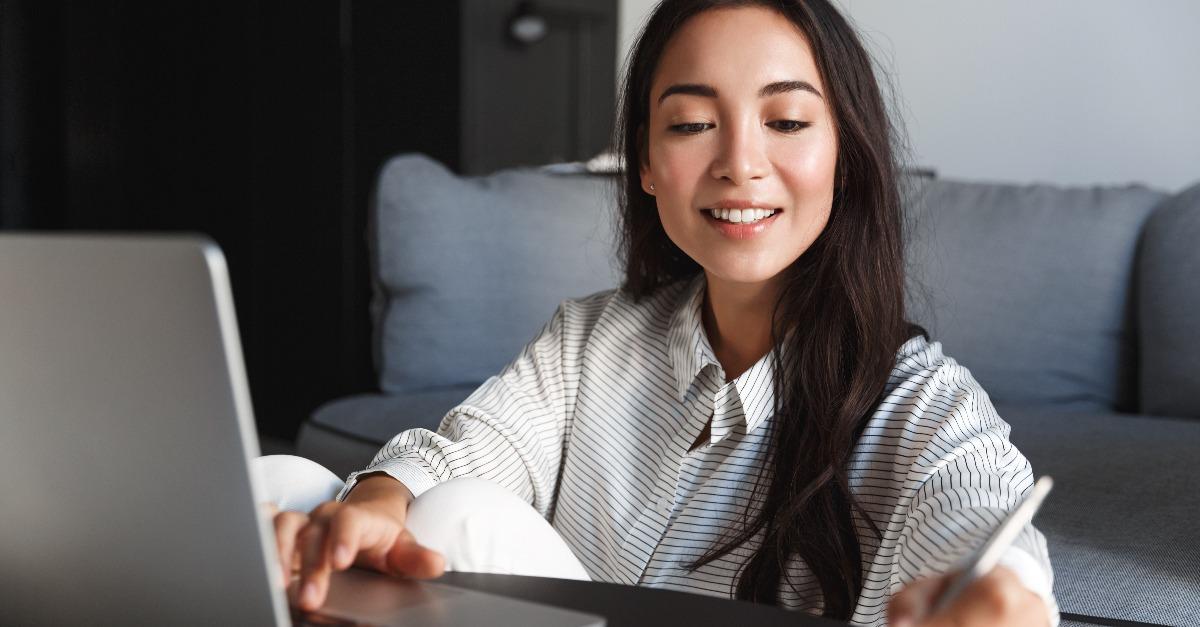 asian girl studying remotely from home